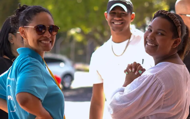 Members of a church community greeting one another outdoors